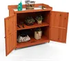 A wooden garden cabinet with its doors open, displaying various gardening tools and plants on its shelves. Náhled obrázku produktu