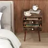 A bedside table with two drawers next to a bed. Náhled obrázku produktu
