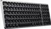A close-up, angled view of a compact, backlit Bluetooth keyboard. Anteprima dell’immagine prodotto
