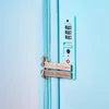Close-up of a light blue suitcase lock and zipper. Náhľad obrázku produktu