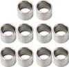 A group of metal washers or spacers arranged in rows on a white background. Podgląd zdjęcia produktu