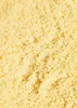A close-up, overhead view of finely ground, blanched almonds. Produktbild-Vorschau