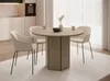 A round dining table with chairs in a modern kitchen setting. Náhled obrázku produktu