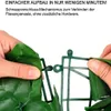 Hände zeigen, wie zwei grüne Kunstpflanzenplatten mit dem Snap-Lock-Mechanismus verbunden werden Anteprima dell’immagine prodotto