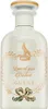 A white bottle of Gucci perfume with gold and green decorative elements. Voir les images du produit