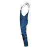 Side view of blue denim overalls against a white background. Náhled obrázku produktu