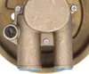 A close-up view of a brass water pump component with two pipes extending downwards. Voir les images du produit
