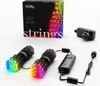 A product shot of Twinkly LED string lights, including the packaging, lights, and power adapter. Produktbild-Vorschau