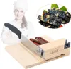 A chef is shown in the background, with a slicer and food in the foreground. Náhled obrázku produktu