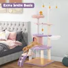 A cat tree is shown next to a bed in a bedroom setting. Podgląd zdjęcia produktu