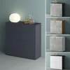 A collage of different sideboard/cabinet variations, with one main image showing a dark gray cabinet with a lamp and decanters on top. Produktbild-Vorschau