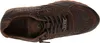 A top-down view of a brown leather sneaker. Voir les images du produit