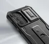 Close-up view of the back of a black smartphone case with a built-in kickstand. Náhľad obrázku produktu
