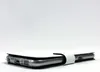 A close-up side view of a brown leather phone case on a white background. Produktbild-Vorschau