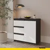 A modern sideboard with drawers and a door, placed in a room with a plant and a lamp. Produktbild-Vorschau