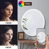 A split image showing two portraits of a woman with different lighting conditions (CRI80+ and CRI70-) on the left, and a round LED bathroom mirror with a smartphone displaying a reflection of the mirror on the right. Produktbild-Vorschau