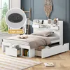 A white bed with storage drawers and a headboard with shelves, set in a bedroom with a ladder and dreamcatcher decoration. Podgląd zdjęcia produktu