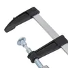 A close-up view of a woodworking clamp. Náhled obrázku produktu