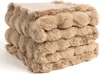 A folded beige faux fur blanket is stacked on a white background. Produktbild-Vorschau