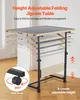 A height-adjustable folding jigsaw table shown in a room with a white wall and wooden floor. The table is depicted in multiple positions to illustrate its height adjustability. Produktbild-Vorschau