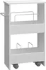 A white rolling cart with two shelves and metal dividers. Voir les images du produit