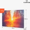 A product image showing an infrared heater with a forest sunset image on it, with dimensions and weight indicated. Náhľad obrázku produktu