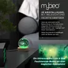 A 3D crystal ball with a solar system engraving, illuminated with green light, sits on a wooden base on a nightstand next to a bed. Text overlays describe the product's features and benefits. Voir les images du produit