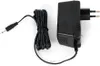 A black electrical adapter with a coiled cord and a 3.5mm jack connector. Náhled obrázku produktu