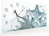 Wanduhr aus Glas mit Motiv Sternspritzer- 60 x 30 cm - Produktbild-Vorschau 2