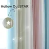 Close-up of sheer curtains with star cutouts in various pastel colors. Náhled obrázku produktu