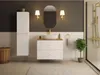 A modern bathroom with a vanity, sink, mirror, and shower. Voir les images du produit