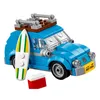A blue LEGO Volkswagen Beetle with a surfboard on the side and a cooler in front. Náhled obrázku produktu