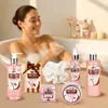 A woman is taking a bath surrounded by bath products. Podgląd zdjęcia produktu