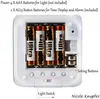 The back of a white alarm clock showing the battery compartment and controls. Produktbild-Vorschau
