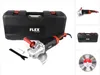 A collection of tools and accessories for an angle grinder, including the grinder itself, a case, a cutting disc, and tools. Produktbild-Vorschau