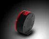The back and side of a black and red alarm clock are shown against a gradient background. Produktbild-Vorschau