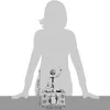 A metallic figurine of a DJ at a mixing desk, with a silhouette of a person behind it indicating scale. Náhľad obrázku produktu