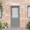 A grey door with a transparent canopy above it, set against a brick wall. Produktbild-Vorschau