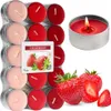 A collage of strawberry-scented tea lights, some in packaging and some loose, with real strawberries. Náhled obrázku produktu