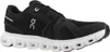 A black and white running shoe is shown from the side against a white background. Anteprima dell’immagine prodotto