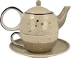 A tea-for-one set consisting of a teapot stacked on top of a cup, placed on a saucer. Produktbild-Vorschau