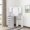 A white corner vanity table with a tri-fold mirror and drawers, set up in a room with a window and curtains. Produktbild-Vorschau