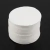 A stack of white round filters on a black background. Produktbild-Vorschau