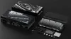 A gaming keyboard and its packaging are displayed on a black surface. Produktbild-Vorschau