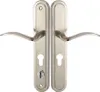 A pair of door handles with keyholes and a lock mechanism, presented against a white background. Podgląd zdjęcia produktu