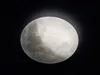A close-up view of the moon against a black background. Náhled obrázku produktu