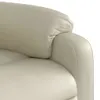 Close-up of a cream-colored leather armchair. Voir les images du produit