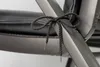 Close-up of a tie on a cushion of a chair. Produktbild-Vorschau