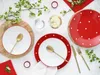 A table setting with plates, cutlery, and glasses. Náhľad obrázku produktu