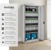A metal filing cabinet filled with binders and boxes, with a side panel detailing its features. Produktbild-Vorschau